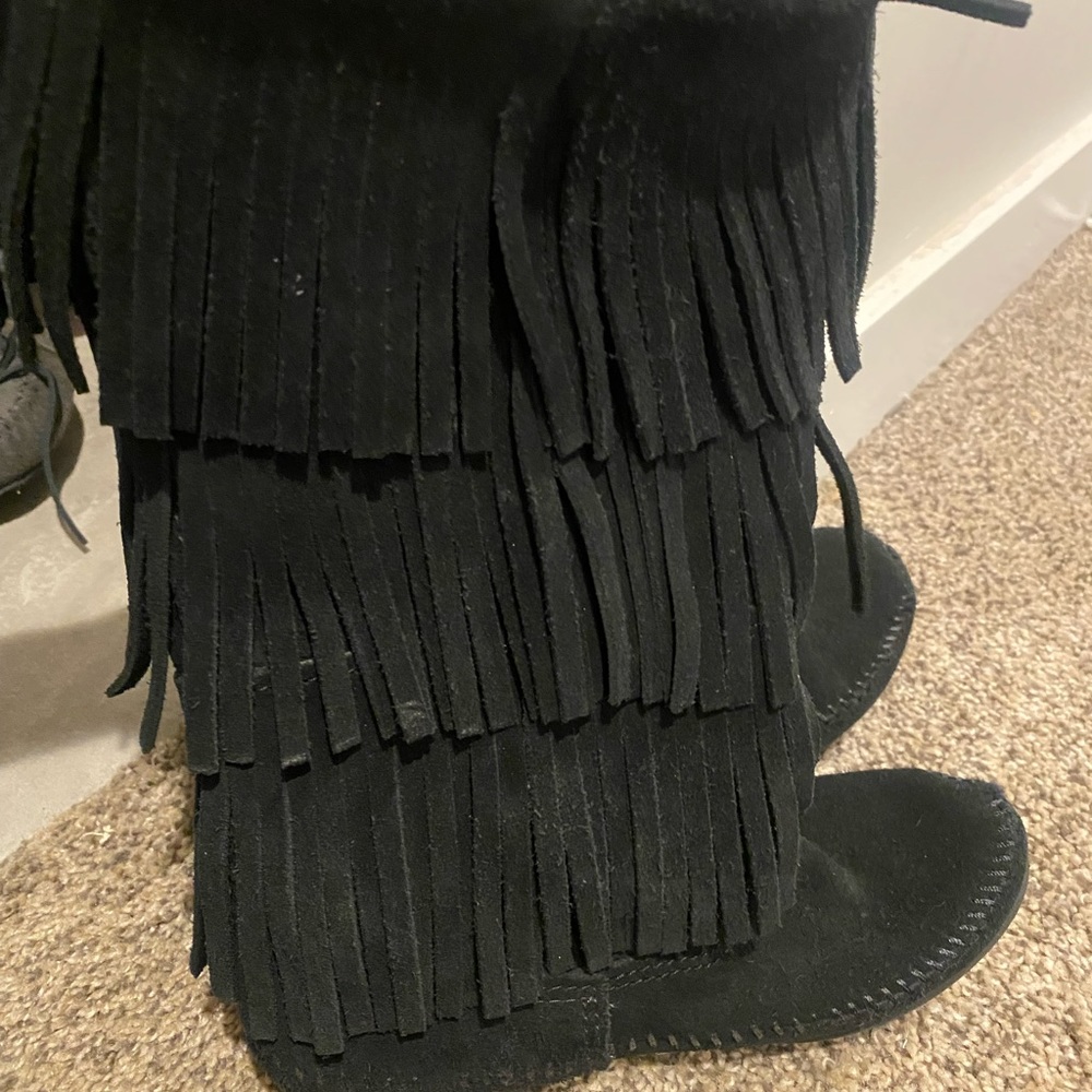 Minnetonka black fringe boots. Size 7